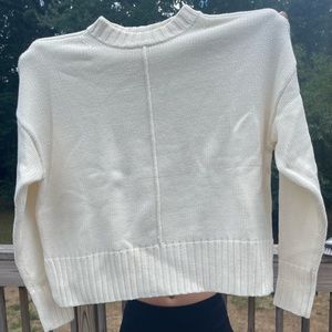 White turtleneck sweater